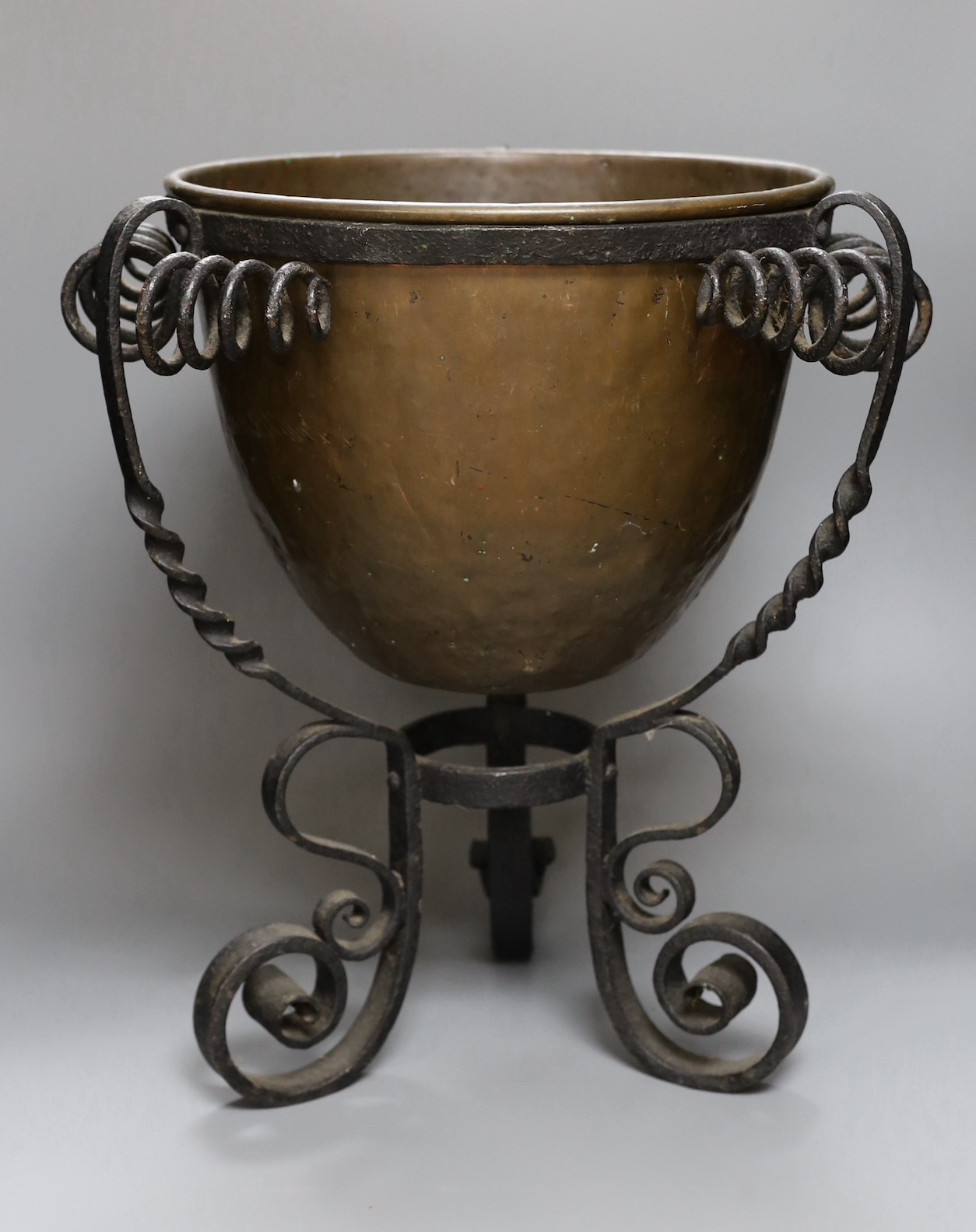 A Spanish copper and wrought iron jardinière, 45cm